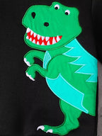 Gros plan graphisme dinosaure sur hoodie enfant - design détaillé et moderne - vêtements BabyCoton
