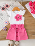 🌸 Petite fille portant un ensemble haut appliqué floral à manches volantées et jupe - vue de face montrant les détails floraux en relief et l'élégance romantique