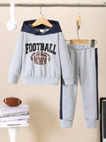 ⚽ Adorable enfant portant ensemble hoodie football graphique dynamique sportif et pantalon coordonné - design motivant inspirant passion sport - tissu ultra-doux confort athlétique - couleurs énergiques vibrantes - style champion petit footballeur - liberté mouvement jeu - vêtements premium qualité BabyCoton Suisse
