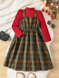 ✨ Adorable petite fille portant un ensemble coordonné 2 pièces : haut manches longues et robe à carreaux - Style élégant et polyvalent pour toutes occasions 👗
