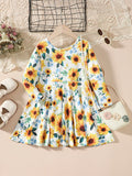 Robe tournesol col rond manches longues pour enfant, vue de face montrant l'imprimé joyeux