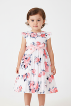 Robe blanche plissée fleurie fille - détail col volant romantique et ceinture nœud satin rose sur imprimé roses roses rouges feuilles bleu nuit - BabyCoton