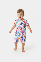Enfant en ensemble animaux colorés blanc - pose en marche - tenue décontractée enfant - BabyCoton