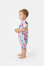 Enfant en ensemble animaux colorés blanc - t-shirt et short motifs animaux rose bleu jaune rouge - vue de côté - BabyCoton
