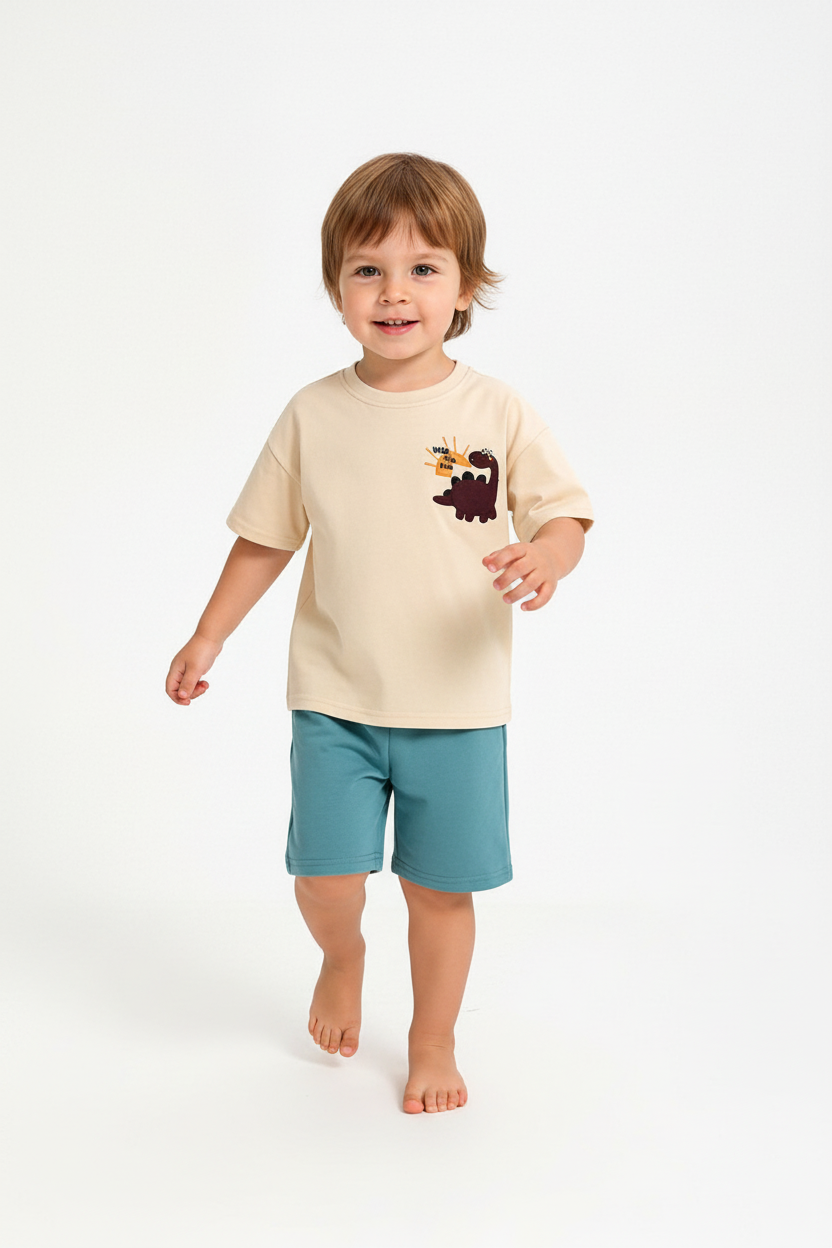 Enfant en ensemble dinosaure beige et bleu - pose en marche - tenue décontractée enfant - BabyCoton