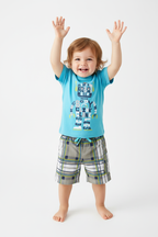 Enfant en ensemble robot bleu turquoise - pose bras levés joyeuse - tenue ludique enfant - BabyCoton