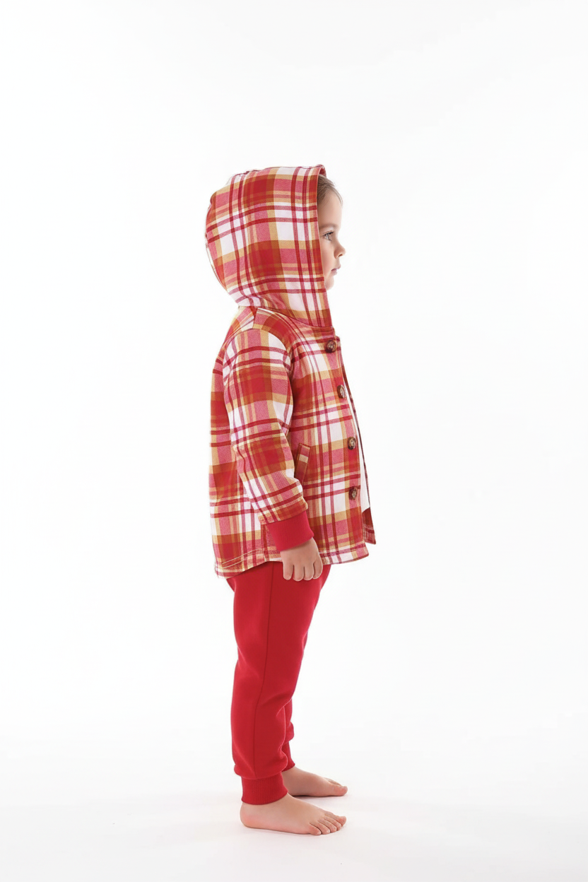 Enfant portant ensemble veste à carreaux boutonnée et pantalon - vue de profil latérale montrant silhouette - coupe décontractée confortable - motif carreaux visible - fond blanc studio - BabyCoton Suisse
